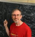 In Kerry Whisnant's campus office, the St. Louis Cardinals' roster and a formula for baseball success sometimes share chalkboard space with jottings about the physics of neutrinos.