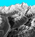 This is a 3-D view of the Barnard glacier in Alaska showing significant quantities of debris that cover the lower parts of the glacier.