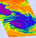 NASA's AIRS instrument provided an infrared look at Tomas' cold thunderstorm cloudtops (blue and purple) on March 14 at 0135 UTC. The storm is more than 300 miles in diameter. The AIRS image gives a viewer a good idea of the size of the storm.