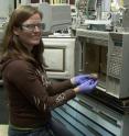 Tara Lovestead prepares a sample of meat (by excising a few milligrams) for testing with a new sampling method developed by NIST researcher Tom Bruno that can detect trace amounts of low volatility compounds produced when perishable foods such as chicken begins to spoil. Tara Lovestead prepares a sample of meat (by excising a few milligrams) for testing with a new sampling method developed by NIST researcher Tom Bruno that can detect trace amounts of low volatility compounds produced when perishable foods such as chicken begins to spoil.