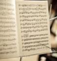 A new method has been developed to automatically detect and identify the musical notes in an audio file and generate sheet music.