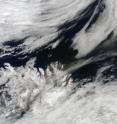 NASA's Terra satellite captured the ash plume from Eyjafjallajokull Volcano, Iceland, on May 18 at 12:20 UTC (8:20 a.m. EDT), blowing to the northeast due to a low pressure area.