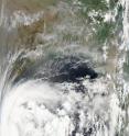 NASA's Aqua satellite captured a visible image of Tropical Storm 1B (lower left) soon after it formed. This image from the MODIS instrument onboard Aqua was taken at 7:25 UTC (12:25 p.m. Asia/Kolkata time) and shows 1B off the east coast of India.