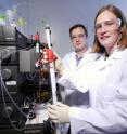 Thomas Barker, an assistant professor in the Wallace H. Coulter Department of Biomedical Engineering at Georgia Tech and Emory University, and postdoctoral fellow Sarah Stabenfeldt purify proteins on an automated fast flow liquid chromatography device. Thomas Barker, an assistant professor in the Wallace H. Coulter Department of Biomedical Engineering at Georgia Tech and Emory University, and postdoctoral fellow Sarah Stabenfeldt purify proteins on an automated fast flow liquid chromatography device.