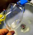 Instead of simply vanishing, a large bubble disperses into a ring of smaller bubbles (as seen on the surface of a wine glass).