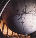 This view shows the exterior of the neutrino detector's 59-foot steel sphere. The scientists expect that geoneutrinos will aid them in better identifying what constitutes matter deep within the Earth.