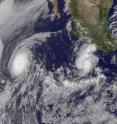 This GOES-13 Satellite imagery from June 25 shows the powerful Hurricane Celia (left) with the larger eye, and behind it is Hurricane Darby (right) with a much smaller eye.