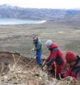 From left to right, Ashley Ballantyne of the University of Colorado at Boulder, Dara Finney of Environment Canada and Natalia Rybczynski of the Canadian Museum of Nature search for fossils in a peat deposit at Strathcona Fiord on Ellesmere Island in Canada's High Arctic.