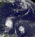 The GOES-13 satellite captured an image of the busy Atlantic Ocean at 1145 UTC (7:45 a.m. EDT) on Aug. 31. In the visible image, was the large and powerful Hurricane Earl (lower left) passing Puerto Rico, Tropical Storm Fiona located to Earl's east, and Tropical Storm Danielle far in the Northern Atlantic.