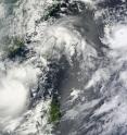 NASA's Terra satellite flew over the Northwestern Pacific Ocean at 02:30 UTC on Aug. 31 (10:30 p.m. EDT Aug. 30) and captured Tropical Storm Lionrock (lower left), Tropical Storm Namtheun (center), and Typhoon Kompasu (top right) off the Asian coast.