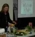 In Lafayette County, Kiersten Firquain, a chef with Bistro Kids, presented a demonstration on creative ways to prepare fresh vegetables and incorporate them into school meals. She also taught knife technique at the Farm to Cafeteria workshop attended by area school food service staff. In 2007, Bistro Kids launched the Farm to School Lunch Program and currently feeds healthy lunches to nearly 1,000 students in Kansas City and St. Louis.