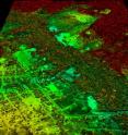 A new high-resolution airborne and satellite mapping approach provides detailed information on carbon stocks in Amazonia. This image shows an area of road building and development adjacent to primary forest in red tones, and secondary forest regrowth in green tones.