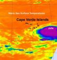 NASA's Aqua satellite captured an infrared image of Tropical Depression 12 early on Sept. 12 when it was just east-southeast of the Cape Verde Islands. At that time it showed strong convection and powerful thunderstorms around its center (purple). By 11 p.m. EDT that day it became Tropical Storm Julia. Warm sea surface temperatures of 80F or higher (orange) surround Julia.