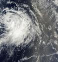 NASA's MODIS instrument on the Terra satellite captured a visible image of Tropical Storm Julia on Sept. 18 at 13:50 UTC (9:50 a.m. EDT) and noticed a large area of Saharan dust over the Atlantic Ocean, to Julia's east (right).