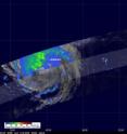The TRMM satellite captured rainfall occurring in monster Hurricane Igor (left) and fading Tropical Depression Julia (right) when it passed over them on Sept. 19 at 1954 UTC (3:54 p.m. EDT). At that time TRMM showed Igor had a large area of rain drenching Bermuda. Red indicates rainfall of up to 2 inches per hour.