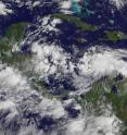 The GOES-13 satellite captured an  image of Tropical Depression 15's rounded clouds at 1445 UTC (10:45 a.m. EDT) on Sept. 23 in the south-central Caribbean Sea.