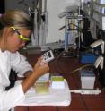 A member of the TUM-Institute of Hydrochemistry with the diclofenac-ELISA, which provides a simple and reliable test on diclofenac even in remote laboratories without extensive equipment.