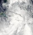 On Sept. 28 at 18:20 UTC 2:20 p.m. EDT the MODIS instrument on NASA's Aqua satellite captured this visible image of Tropical Storm Nicole over Cuba before it weakened back into a tropical depression. Nicole was already losing her cyclonic shape at that time.