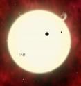 This is an artist's concept of an exoplanet and its moon transiting a sun-like star. Such a system could be used to directly weigh the star.