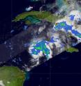 NASA's Tropical Rainfall Measuring Mission (TRMM) satellite captured the rainfall within System 99L on Oct. 20 at 0410 UTC (12:10 a.m. EDT) and noticed light to moderate rainfall within the system. The yellow and green areas indicate moderate rainfall between .78 to 1.57 inches per hour.