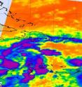 This infrared image of Tropical Depression Tomas was captured by the Atmospheric Infrared Sounder instrument aboard NASA's Aqua satellite on Nov. 3 at 06:17 UTC (2:17 a.m. EDT). Remaining strong, high thunderstorm cloud tops (purple) appear scattered around the depression's center of circulation.