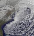 On Monday, Dec. 27 at 1731 UTC (12:31 p.m. EST) the GOES-13 satellite captured this visible image of the powerful low pressure system that brought snows from Georgia to Maine along the US east coast. Some of the snowfall can be seen over South and North Carolina, Virginia, Maryland, Delaware, eastern Pennsylvania, New Jersey and southeastern New York. The clouds of the low obscure New England in the image.