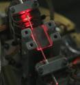 Researchers at the University of Calgary and University of Paderborn designed a quantum memory device using a waveguide in a crystal doped with rare-earth ions.