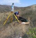 Bodo Bookhagen works with a lidar device that his group uses for detecting changes in the landscape, including on snow fields and glaciers.