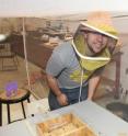 Mechanical engineering senior (and beekeeper) Sean Phillips prepares bees for tracking of their flight patterns in the UA College of Engineering's Hybrid Dynamics and Control Laboratory in Tucson, Ariz.