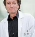 This is Mark H. Tuszynski, M.D., Ph.D., of the University of California - San Diego.
