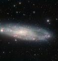 This picture of the spiral galaxy NGC 247 was taken using the Wide Field Imager (WFI) at ESO's La Silla Observatory in Chile. NGC 247 is thought to lie about 11 million light-years away in the constellation of Cetus (The Whale). It is one of the closest galaxies to the Milky Way and a member of the Sculptor Group.