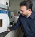 This is NJIT professor Somenath Mitra working in his lab.