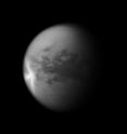 A huge arrow-shaped storm blows across the equatorial region of Titan in this image from NASA's Cassini spacecraft, chronicling the seasonal weather changes on Saturn's largest moon.