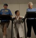 Senior exercisers speak with Dennis T. Villareal, MD, while participating in a study to find effective ways to boost physical function and reduce frailty in the elderly. Both were obese when the study began but lost weight through a combination of diet and exercise.