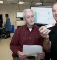 Timothy Ley, M.D., left, and Richard Wilson, Ph.D., and their Washington University colleagues have shown the power of sequencing cancer patients' genomes as a diagnostic tool.