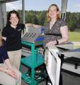 Using this simple radar system, GTRI research engineers Jennifer Palmer, Kristin Bing and Amy Sharma (left-right) were able to detect differences in the gait patterns of normal and impaired individuals. This simple concussion test could be performed on the sideline of a sporting event or on a battlefield.