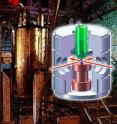 Spectroscopy with conventional nuclear magnetic resonance (NMR) requires large, expensive, superconducting magnets cooled by liquid helium, like the one in the background. The Pines and Budker groups have demonstrated NMR spectroscopy with a device only a few centimeters high, using no magnets at all (foreground). The chemical sample in the test tube (green) is polarized by introducing parahydrogen. The spectrum of the sample is read using a microfabricated vapor cell (center) whose contents are polarized by a pump laser and read with a probe laser, which enter the vapor cell at right angles.
