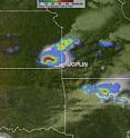 NASA's TRMM satellite passed over the supercell of thunderstorms before it raked over Joplin, Mo., on May 22, 2011. TRMM captured this image (the first image of the animated GIF below) of the cell's rainfall at 20:42 UTC (3:42 p.m. CDT local time). The yellow and green areas indicate moderate rainfall between .78 to 1.57 inches per hour. Red areas are considered heavy rainfall at almost two inches per hour.