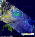 NASA's TRMM satellite captured this image of rainfall happening within Typhoon Songda on May 25, 2011, at 0903 UTC. The yellow and green areas indicate moderate rainfall between .78 to 1.57 inches (20 to 40 mm) per hour. Songda was an intensifying category 3 typhoon with winds near 105 kts at that time.