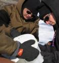 William D'Andrea, right, and Yongsong Huang of Brown University took cores from two lakes in Greenland to reconstruct 5,600 years of climate history near the Norse Western Settlement.