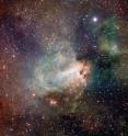 The first released VST image shows the spectacular star-forming region Messier 17, also known as the Omega Nebula or the Swan Nebula, as it has never been seen before. This vast region of gas, dust and hot young stars lies in the heart of the Milky Way in the constellation of Sagittarius (The Archer). The VST field of view is so large that the entire nebula, including its fainter outer parts, is captured -- and retains its superb sharpness across the entire image. The data were processed using the Astro-WISE software system developed by E.A. Valentijn and collaborators at Groningen and elsewhere.