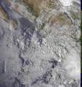 This visible image of Beatriz' remnants was taken from the GOES-11 satellite on June 22 at 13:30 UTC (9:30 a.m. EDT) and shows a disorganized clouds off the western coast of Mexico.