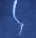 A chemical trail like the one here -- this one deployed from a sounding rocket at night as opposed to in the daytime -- will help researchers track wind movement to determine how it affects the movement of charged particles in the atmosphere.
