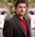 Cognitive psychologist Justin Couchman is seen here with Murph, one of the rhesus monkeys who helped Couchman demonstrate that his species does indeed possess a form of self awareness.