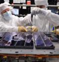 A total of 106 CCDs make up Gaia's focal plane. Technicians from Astrium France, the Gaia mission's prime contractor, are seen bolting and aligning the CCDs onto their support structure, at the company's facility in Toulouse.
The structure (the gray plate underneath the CCDs) weighs about 20 kg and is made of silicon carbide, a material that provides remarkable thermal and mechanical stability.
Gaia's CCDs are provided by e2v Technologies of Chelmsford, UK. Each CCD measures 4.7x6 cm, with a thickness of only a few tens of microns. Precisely fitted together on the support structure, the gap between adjacent CCD packages is about 1 mm.