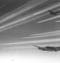 This is a formation of B-17F Flying Fortress bombers of USAAF 92nd Bomb Group over Europe, circa 1943 .