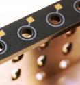 This tailpiece is coated with a thin-film sensor system. It converts the tension on the string into digital control signals. This tailpiece is coated with a thin-film sensor system. It converts the tension on the string into digital control signals.
