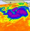 NASA's Aqua satellite passed over Tropical Storm Dora on July 19 at 20:11 UTC (4:11 p.m. EDT). NASA's AIRS infrared imagery showed strong thunderstorms all around the center of circulation (purple) where heavy rain was falling.