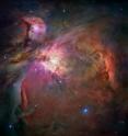 This dramatic image offers a peek inside a 'cavern' of dust and gas where thousands of stars are forming. The image, taken by the Advanced Camera for Surveys (ACS) aboard NASA's Hubble Space Telescope, represents the sharpest view ever taken of this region, called the Orion Nebula. More than 3000 stars of various sizes appear in this image. Some of them have never been seen in visible light.

The Orion Nebula is 1500 light-years away, the nearest star-forming region to Earth. Astronomers used 520 Hubble images, taken in five colors, to make this picture. They also added ground-based photos to fill out the nebula. The ACS mosaic covers approximately the apparent angular size of the full Moon. These observations were taken between 2004 and 2005.