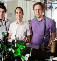 Physics professor Brian DeMarco, center, and graduate students Stanimir Kondov, left, and William McGehee were the first to trap waves of quantum matter in three dimensions.